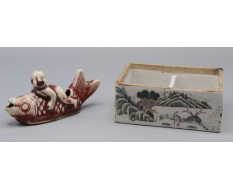 A Chinese famille rose porcelain box, 19th century, with two compartments and decorated with river scenes and calligraphy, he