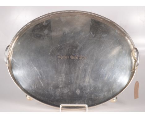 A twin handle pierced gallery tray on bun feet inscribed 'Thorley's Special Prize', length 52cm, together with an Albrecht Du