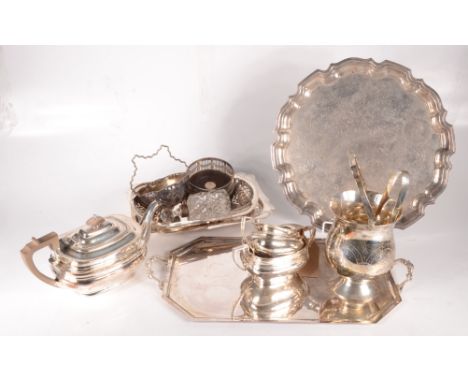 Miscellaneous silver plated items, including a three piece tea set, trays, etc and a cut glass scent bottle with a silver col