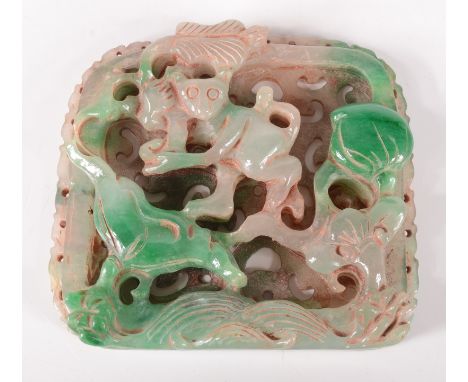 A Chinese carved jade panel showing a lemur, a lily, fungus and a peach on a cloud pierced ground above waves 70 x 78mm, maxi
