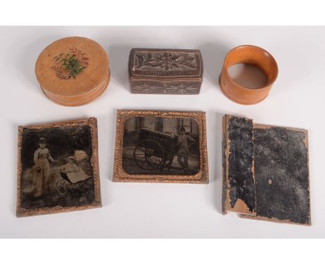 A Mauchline ware Lostwithiel Church snuff box, diameter 7cm, a napkin ring, two ambrotypes and a Black Forest snuff box inscr