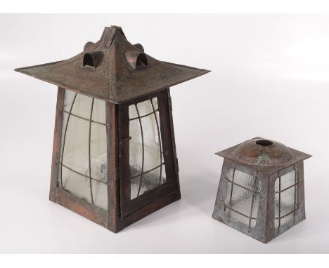 An Art Nouveau copper hanging lantern, height 33cm, width 25cm, depth 24cm and another smaller lantern, height 15cm, width 11