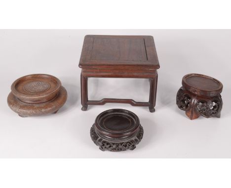 A Chinese huali wood silver inlaid stand, the body decorated with dragons and cloud scrolls, the top similarly decorated, hei