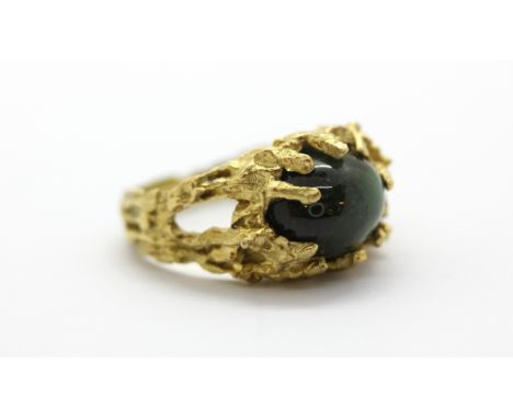 An H. Stern 18ct yellow gold (stamped 750) ring set with a large cabochon cut green tourmaline, (P).