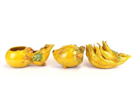 Three interesting yellow glazed ceramic calligraphers water droppers, H. 8cm.
