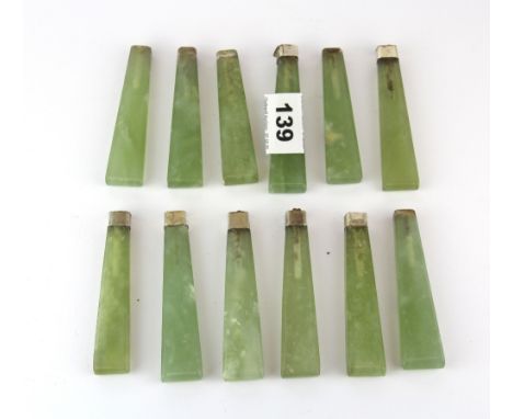 A collection of 12 19th Century jade cutlery handles, L. 9cm.