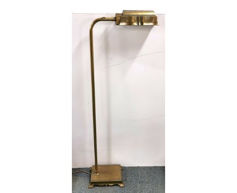 A 1920's brass reading light, H. 125cm.