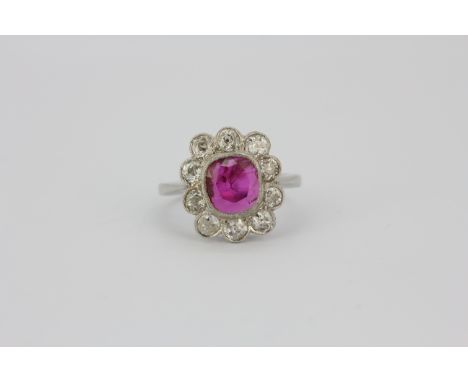A 950 platinum cluster ring set with a 2.16ct cushion cut natural untreated Burmese ruby surrounded by old brilliant cut diam