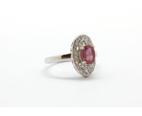 A 925 silver ruby and white stone set ring, (N.5).