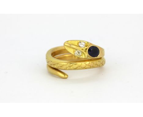 A yellow metal (tested 18ct yellow gold) sapphire and diamond set snake shaped ring, (O).