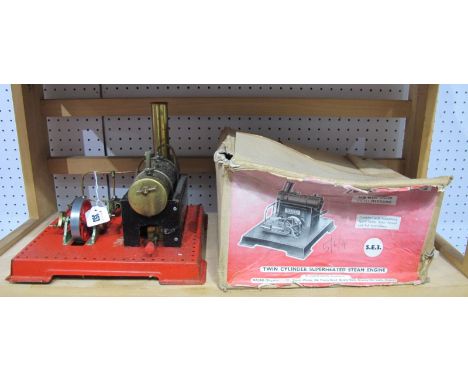 A Mamod SE3 Twin Cylinder Live Steam Engine, with burner and instructions, boxed. Playworn.