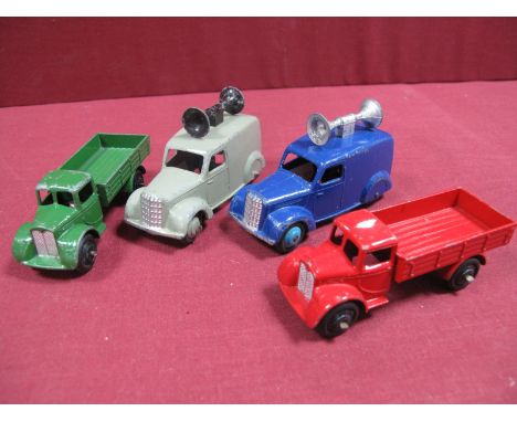 Four Original Dinky Commercial Vehicles, #22C Motor Truck (2), one piece casting, one red body, one green body, both black hu