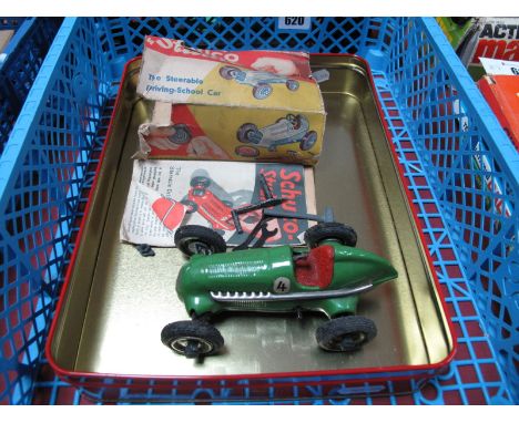 An Original Schuco of Germany Studio Racing Car, finished in green, clockwork, overall very good but missing steering wheel, 