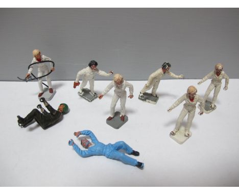 Seven Britains Plastic Garage Staff Figures, plus a Britains plastic Army Despatch Rider (no bike). Good to playworn.
