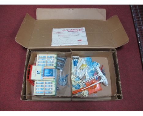 A Original 1960's Atomic Cape Canaveral Missile Base Playset by Marx, tin building, plastic figures and accessories. With ins