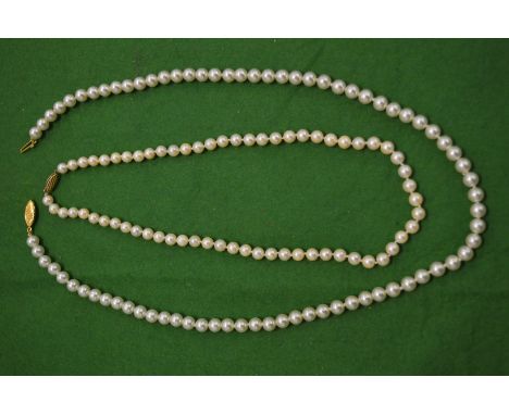Two pearl necklaces.