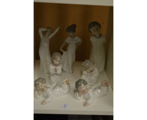 Lladro and Nao figures.