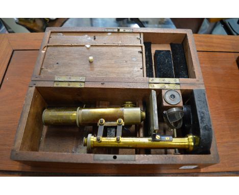 A Leitz Wetzlar mahogany cased brass microscope.