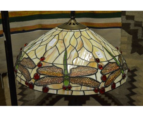 A Tiffany style dragonfly ceiling light fitting.