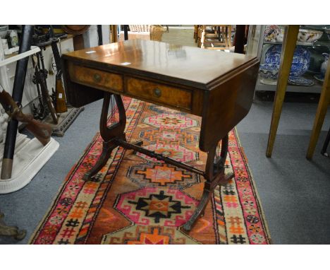 A small mahogany sofa table.