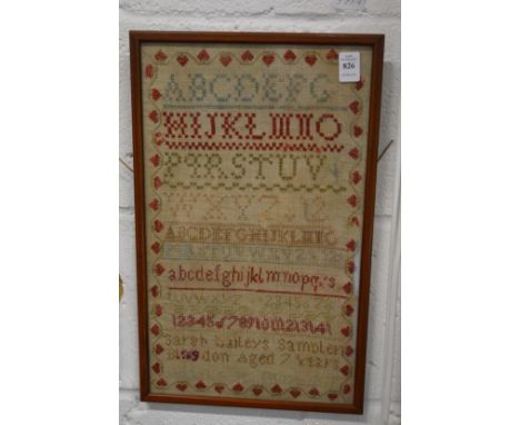 An alphabet sampler, probably 19th century, signed Sarah Baileys sampler Blangdon (?) aged 7½ years.