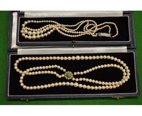 A good pearl necklace with 9ct gold and gem set clasp together with another pearl necklace.