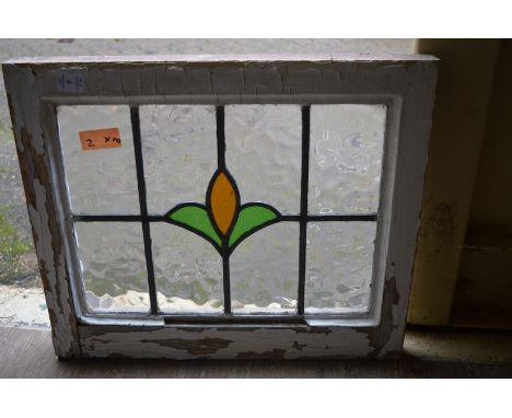 Ten small stained glass leaded light windows.