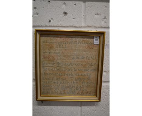A small alphabet sampler dated 1838.