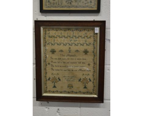 A 19th century sampler with alphabet, flowers, birds and text, signed Mary Ann Dalton August 28th 1844, aged nine years.