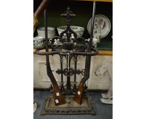 A Victorian cast iron stick stand.