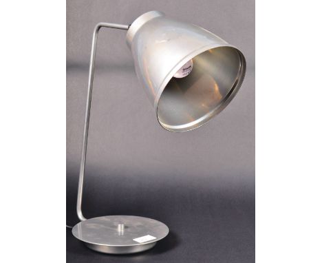 A vintage late 20th Century Italian desk / table lamp light of polished metal construction having an adjustable pendant shade