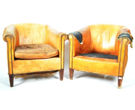 A pair of retro vintage 20th Century Dutch club chairs / tub fireside armchairs having tan brown sheepskin leather upholstery