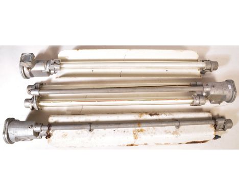 A selection of three large 20th Century retro vintage Industrial explosion proof suspension tube strip lights by Thorn. Two s