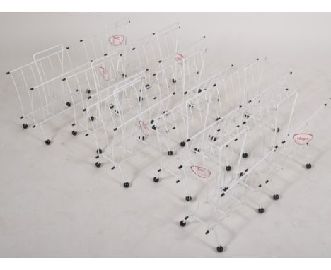 Hago - Model 161 - A collection of six retro vintage industrial atomic space age sputnik magazine racks of tubular form with 