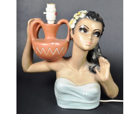 A retro vintage mid 20th Century 1960's Tretchikoff era chalkware Hawaiian girl lamp light being polychrome decorated with ha