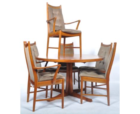 Edward Valentinsen (Manner of) - A retro vintage 1960's Danish Scandinavian teak wood extending dining table of rounded form 