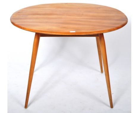 Lucian Ercolani - Ercol - Model 396 - A retro mid 20th Century 1960's beech and elm breakfast dining table having a circular 