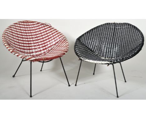 A pair of retro vintage 20th Century wicker cane satellite chairs in the manner of Franco Albini. The circle tub shaped chair