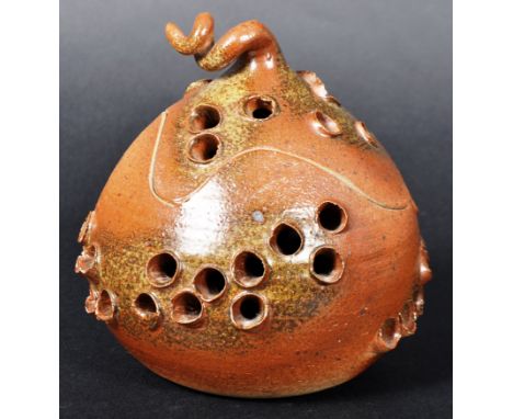 A late 20th century Gunni Nordstrom danish studio art pottery. Bulbed shaped tealight candle holder or incense holder with li