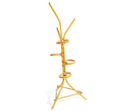 A retro vintage mid 20th Century 1950's / 1960's Italian cane / wicker bamboo multi tier plant stand in the manner of Franco 