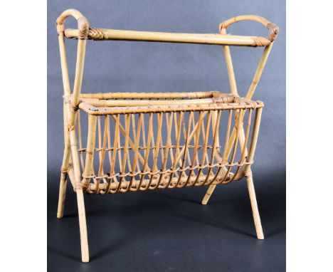A vintage retro mid 20th Century magazine rack / Canterbury holder side table of cane and bamboo construction having a rectan