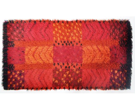 An original retro vintage mid 20th Century wool shag pile floor carpet rug / runner of rectangular form having a red ground f