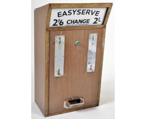 Easyserve - A retro mid 20th Century fairground / funfair / amusement park change machine of wooden construction with perspex
