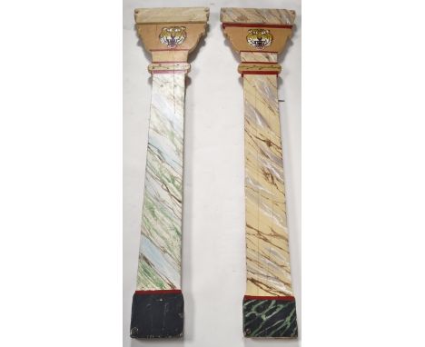 Two vintage mid 20th Century fairground / funfair faux marble painted uprights / pillars each with painted lion masks atop wi