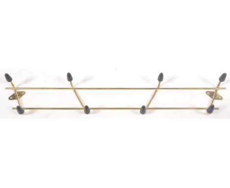 A set of retro vintage mid 20th Century sputnik atomic coat hooks of twin bar shape form with painted coloured ball finials a
