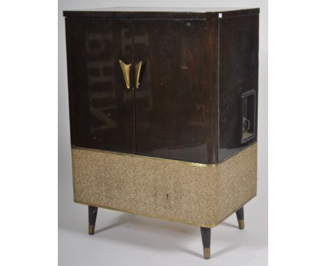 A retro vintage mid 20th Century Polaroid Pam television TV. Contained within a twin door case with gilt metal handles. Label