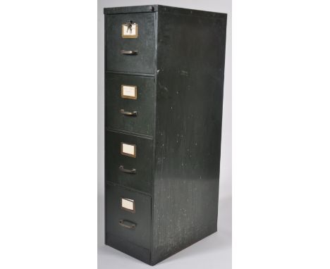 A retro vintage industrial mid 20th Century metal tall green painted factory filing cabinet. Comprises four large drawers wit