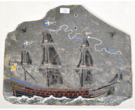 An unusual 20th Century slate panel having a hand painted enamel scene depicting a 17th Century four masted Swedish galleon s