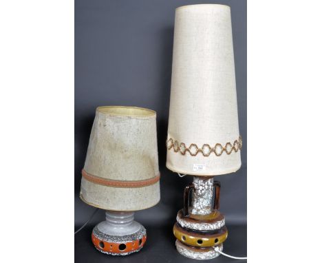 Two original retro vintage 1960's West German Fat Lava pottery lamps / vases comprising an example in red with pierced holes 