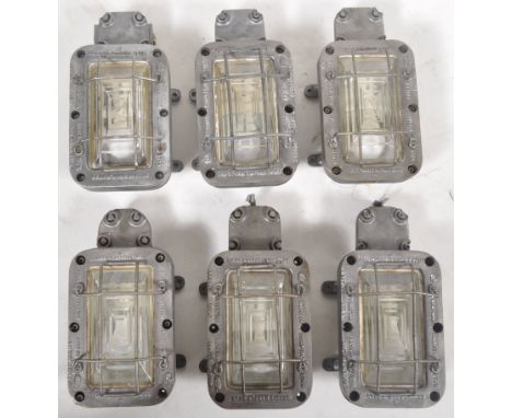 A matching set of six retro mid 20th Century industrial bulkhead lamp lights with each of rectangular form with cast iron cas